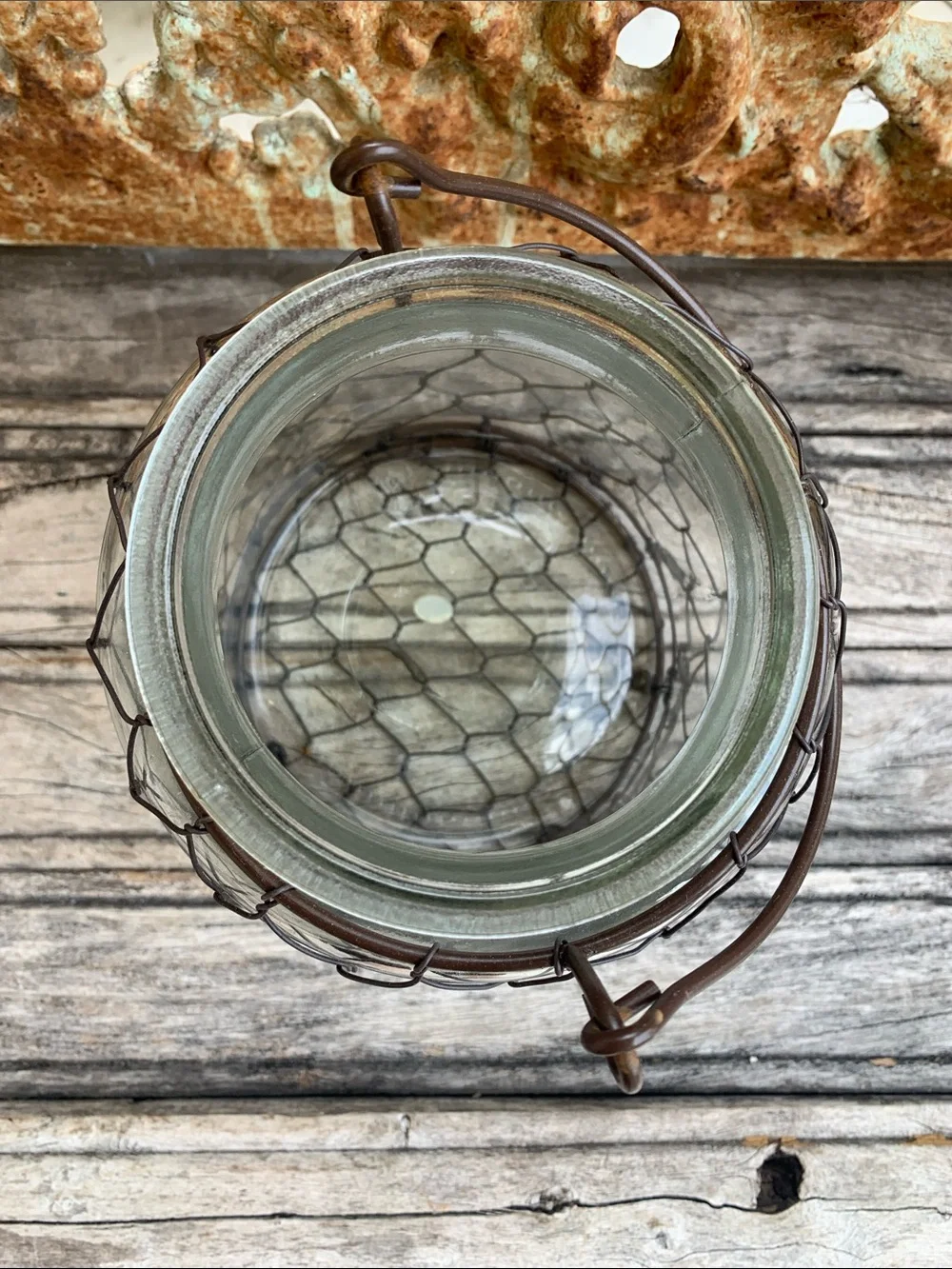 Clear Glass Lantern with Coppery Chicken Wire Cage with Handle